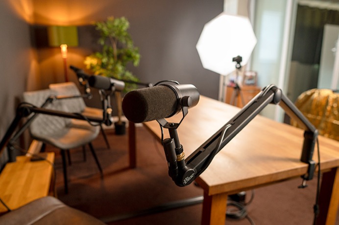 Podcast room at Material Studios recording with Shure SM7B microphone